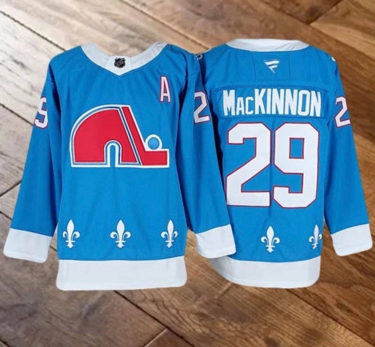 COLORADO AVALANCHE NATHAN MACKINNON BLUE JERSEY