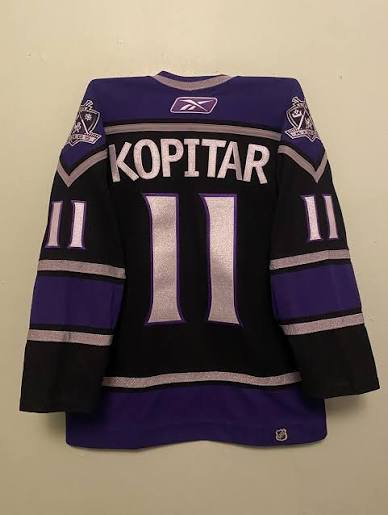 LA KINGS KOPITAR PURPLE AND BLACK JERSEY